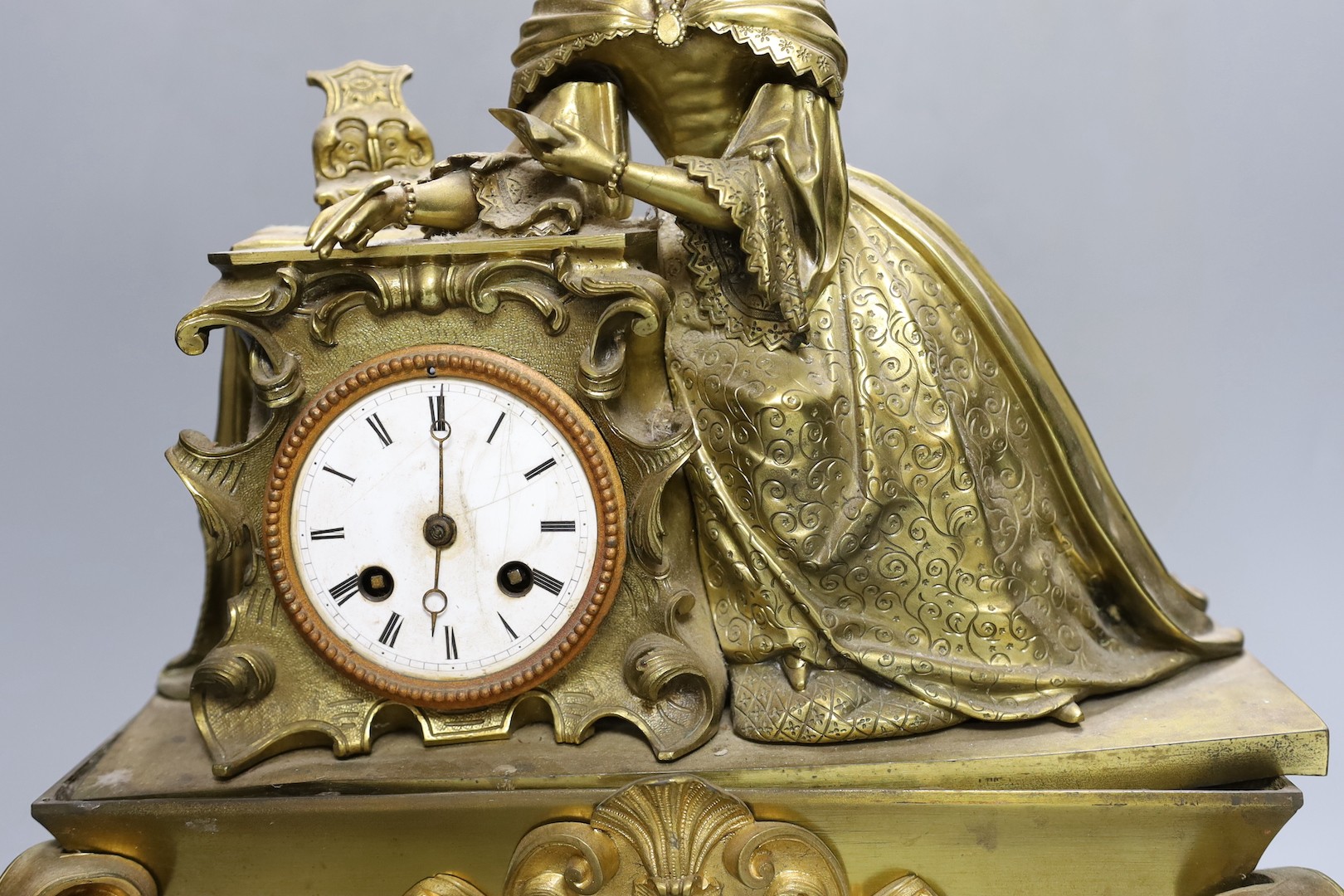 A Louis XV style gilt bronze 8 day mantel clock (dismantled)